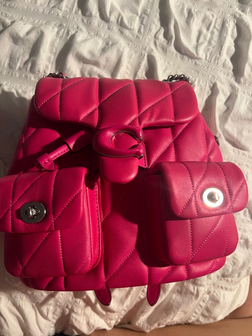 Pink Coach leather backpack
